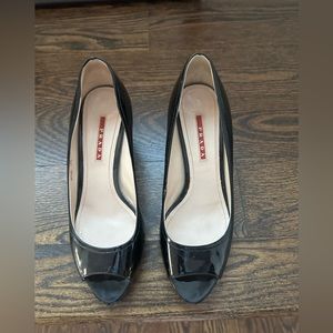 Prada sport patent leather wedge heel in black size 9